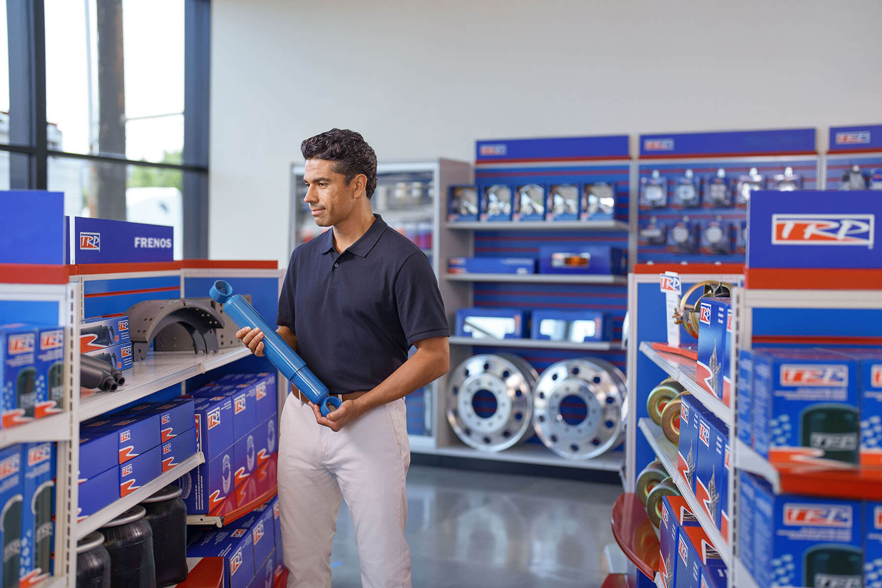 Image of a man looking at TRP parts
